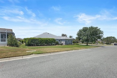 Welcome Home to this stunning Stretched Mandevilla model in the on The Links of Spruce Creek in Florida - for sale on GolfHomes.com, golf home, golf lot