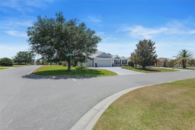 Welcome Home to this stunning Stretched Mandevilla model in the on The Links of Spruce Creek in Florida - for sale on GolfHomes.com, golf home, golf lot