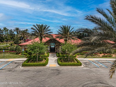 Enjoy low-maintenance living in this two-story townhome located on Golf Club At Fleming Island in Florida - for sale on GolfHomes.com, golf home, golf lot