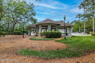 Enjoy low-maintenance living in this two-story townhome located on Golf Club At Fleming Island in Florida - for sale on GolfHomes.com, golf home, golf lot