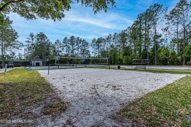 Enjoy low-maintenance living in this two-story townhome located on Golf Club At Fleming Island in Florida - for sale on GolfHomes.com, golf home, golf lot