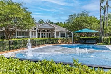 Enjoy low-maintenance living in this two-story townhome located on Golf Club At Fleming Island in Florida - for sale on GolfHomes.com, golf home, golf lot