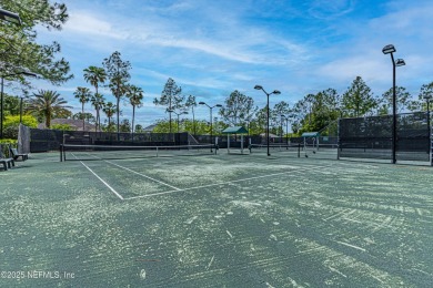 Enjoy low-maintenance living in this two-story townhome located on Golf Club At Fleming Island in Florida - for sale on GolfHomes.com, golf home, golf lot