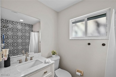 Welcome to 18470 Geranium Road, where MODERN style meets WARM on Estero Country Club in Florida - for sale on GolfHomes.com, golf home, golf lot