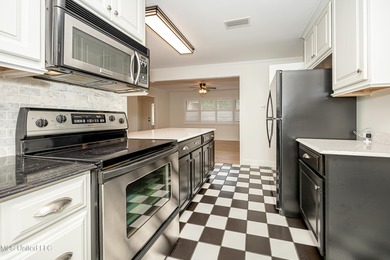 LOCATION LOCATION LOCATION! Welcome to this beautifully updated on Gulf Hills Golf Club in Mississippi - for sale on GolfHomes.com, golf home, golf lot