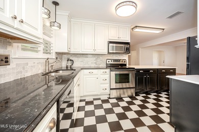 LOCATION LOCATION LOCATION! Welcome to this beautifully updated on Gulf Hills Golf Club in Mississippi - for sale on GolfHomes.com, golf home, golf lot