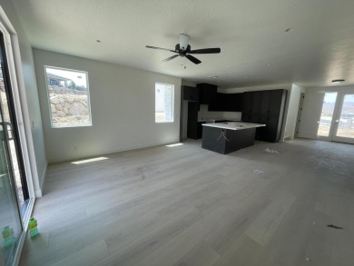 Nestled just two minutes from Sunbrook Golf Course, this elegant on Sunbrook Golf Course in Utah - for sale on GolfHomes.com, golf home, golf lot