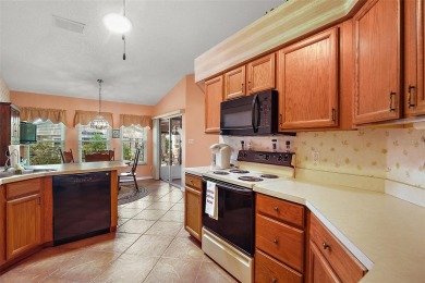 This spacious 3-bedroom, 2-bathroom home with a 2-car garage on Plantation Golf Club in Florida - for sale on GolfHomes.com, golf home, golf lot