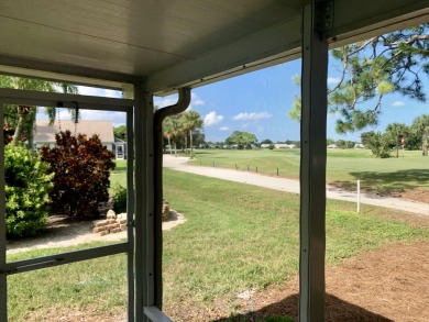 This gorgeous golf-view home has been totally renovated in 2024 on The Golf Club of Jupiter in Florida - for sale on GolfHomes.com, golf home, golf lot