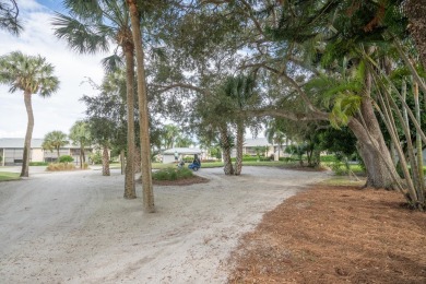 This gorgeous golf-view home has been totally renovated in 2024 on The Golf Club of Jupiter in Florida - for sale on GolfHomes.com, golf home, golf lot