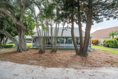 This gorgeous golf-view home has been totally renovated in 2024 on The Golf Club of Jupiter in Florida - for sale on GolfHomes.com, golf home, golf lot