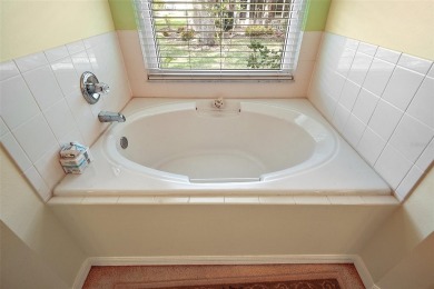 This spacious 3-bedroom, 2-bathroom home with a 2-car garage on Plantation Golf Club in Florida - for sale on GolfHomes.com, golf home, golf lot