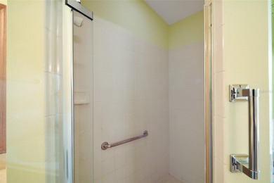 This spacious 3-bedroom, 2-bathroom home with a 2-car garage on Plantation Golf Club in Florida - for sale on GolfHomes.com, golf home, golf lot