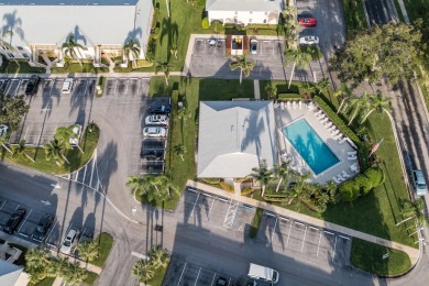 This gorgeous golf-view home has been totally renovated in 2024 on The Golf Club of Jupiter in Florida - for sale on GolfHomes.com, golf home, golf lot