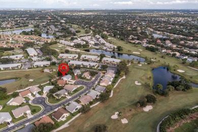 This gorgeous golf-view home has been totally renovated in 2024 on The Golf Club of Jupiter in Florida - for sale on GolfHomes.com, golf home, golf lot