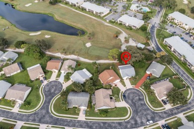 This gorgeous golf-view home has been totally renovated in 2024 on The Golf Club of Jupiter in Florida - for sale on GolfHomes.com, golf home, golf lot