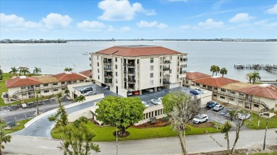 Live the Florida dream in this beautiful waterfront condo on on Isla Del Sol Yacht and Country Club in Florida - for sale on GolfHomes.com, golf home, golf lot