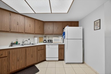 Live the Florida dream in this beautiful waterfront condo on on Isla Del Sol Yacht and Country Club in Florida - for sale on GolfHomes.com, golf home, golf lot
