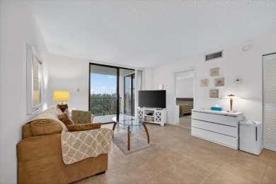 Live the Florida dream in this beautiful waterfront condo on on Isla Del Sol Yacht and Country Club in Florida - for sale on GolfHomes.com, golf home, golf lot