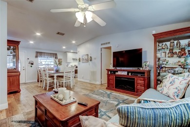 Welcome home to this beautifully updated three-bedroom, two-bath on Palm Hill Golf Club in Florida - for sale on GolfHomes.com, golf home, golf lot