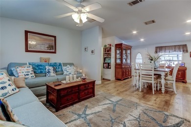 Welcome home to this beautifully updated three-bedroom, two-bath on Palm Hill Golf Club in Florida - for sale on GolfHomes.com, golf home, golf lot