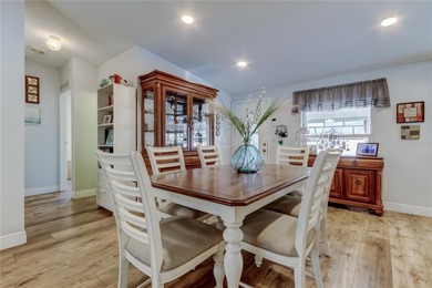 Welcome home to this beautifully updated three-bedroom, two-bath on Palm Hill Golf Club in Florida - for sale on GolfHomes.com, golf home, golf lot