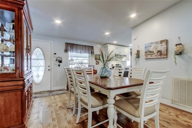 Welcome home to this beautifully updated three-bedroom, two-bath on Palm Hill Golf Club in Florida - for sale on GolfHomes.com, golf home, golf lot