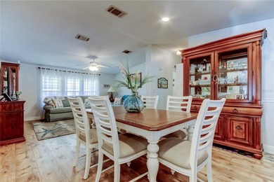 Welcome home to this beautifully updated three-bedroom, two-bath on Palm Hill Golf Club in Florida - for sale on GolfHomes.com, golf home, golf lot