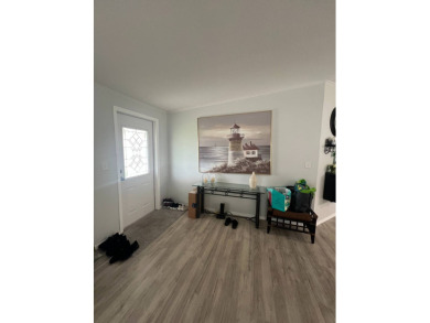 Charming Updated and Modern home with privacy and stunning water on Lake Henry Golf Club in Florida - for sale on GolfHomes.com, golf home, golf lot