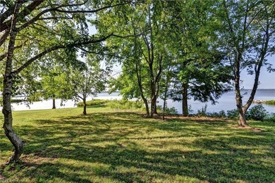 A rare, one-of-a-kind opportunity to own the LAST buildable on Two Rivers Country Club in Virginia - for sale on GolfHomes.com, golf home, golf lot