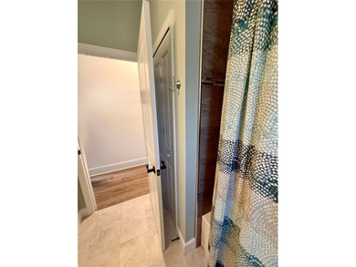 Experience relaxed coastal living in this updated 3-bedroom on Ocean Palm Golf Course in Florida - for sale on GolfHomes.com, golf home, golf lot