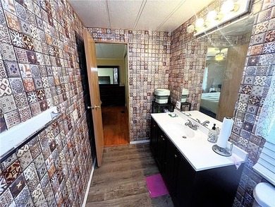 Welcome to your dreamy retreat in a vibrant 55+ community! This on Royal Links Golf Club in Nevada - for sale on GolfHomes.com, golf home, golf lot