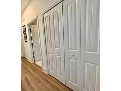 Experience relaxed coastal living in this updated 3-bedroom on Ocean Palm Golf Course in Florida - for sale on GolfHomes.com, golf home, golf lot