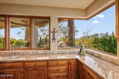 This spectacular custom home is a true desert retreat, ideally on The Boulders Resort Golf Club in Arizona - for sale on GolfHomes.com, golf home, golf lot