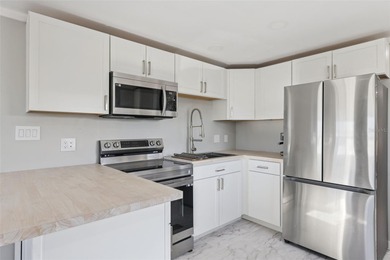 Welcome to this beautifully remodeled, energy-efficient home on Polo Park East in Florida - for sale on GolfHomes.com, golf home, golf lot