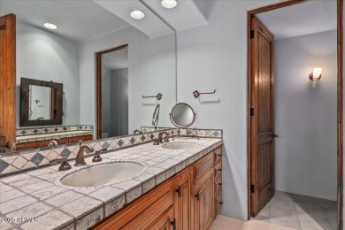 This spectacular custom home is a true desert retreat, ideally on The Boulders Resort Golf Club in Arizona - for sale on GolfHomes.com, golf home, golf lot