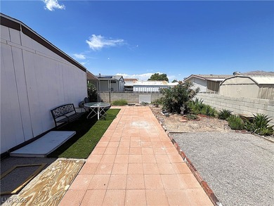Welcome to your dreamy retreat in a vibrant 55+ community! This on Royal Links Golf Club in Nevada - for sale on GolfHomes.com, golf home, golf lot