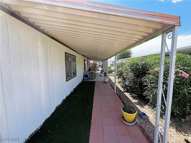 Welcome to your dreamy retreat in a vibrant 55+ community! This on Royal Links Golf Club in Nevada - for sale on GolfHomes.com, golf home, golf lot