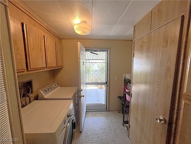 Welcome to your dreamy retreat in a vibrant 55+ community! This on Royal Links Golf Club in Nevada - for sale on GolfHomes.com, golf home, golf lot