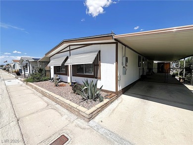 Welcome to your dreamy retreat in a vibrant 55+ community! This on Royal Links Golf Club in Nevada - for sale on GolfHomes.com, golf home, golf lot