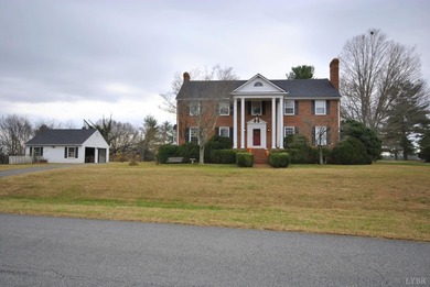 Enjoy mountain views from the front of this traditional on Ivy Hill Golf Club in Virginia - for sale on GolfHomes.com, golf home, golf lot