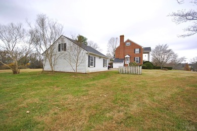 Enjoy mountain views from the front of this traditional on Ivy Hill Golf Club in Virginia - for sale on GolfHomes.com, golf home, golf lot
