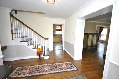 Enjoy mountain views from the front of this traditional on Ivy Hill Golf Club in Virginia - for sale on GolfHomes.com, golf home, golf lot