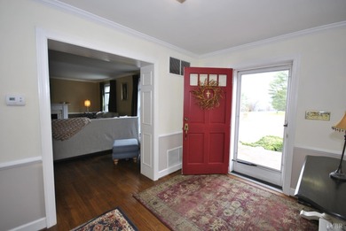 Enjoy mountain views from the front of this traditional on Ivy Hill Golf Club in Virginia - for sale on GolfHomes.com, golf home, golf lot