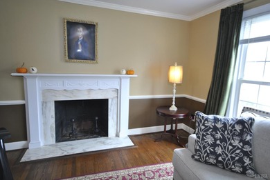 Enjoy mountain views from the front of this traditional on Ivy Hill Golf Club in Virginia - for sale on GolfHomes.com, golf home, golf lot