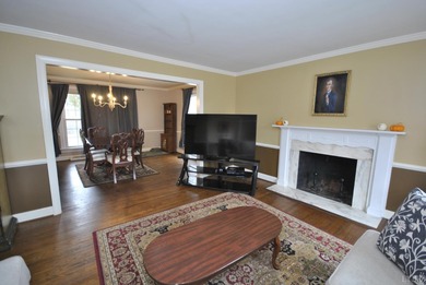 Enjoy mountain views from the front of this traditional on Ivy Hill Golf Club in Virginia - for sale on GolfHomes.com, golf home, golf lot