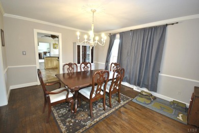 Enjoy mountain views from the front of this traditional on Ivy Hill Golf Club in Virginia - for sale on GolfHomes.com, golf home, golf lot