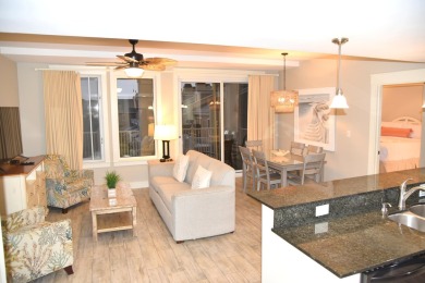 Watch the sunset on the Bay from this  condo's extensive veranda on Sandestin Golf and Beach Resort - Raven in Florida - for sale on GolfHomes.com, golf home, golf lot