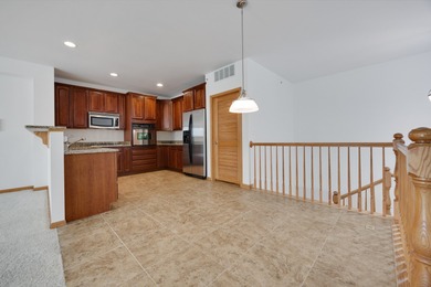 North facing upper-level unit in the exclusive Lions Gate on Fox Run Golf Links in Illinois - for sale on GolfHomes.com, golf home, golf lot