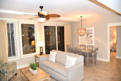 Watch the sunset on the Bay from this  condo's extensive veranda on Sandestin Golf and Beach Resort - Raven in Florida - for sale on GolfHomes.com, golf home, golf lot